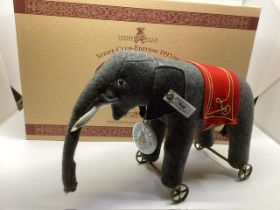 Steiff 22cm Grey Elephant on wheels 1914 replica  made in 1997, boxed with certificate , grey with