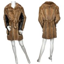 A vintage 1970s leather and mink  2/3 length coat, in pastel mink with dark chocolate leather