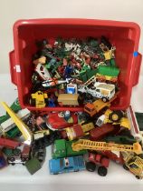 Large tub of vintage play-worn diecast vehicles and small plastic large selection of figures and