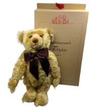 A vintage 1999 Millenium Blonde Steiff growler teddy bear toy created to celebrate the new Millenium