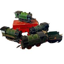 A collection of vintage Hornby O Gauge locos to include a clockwork 50153 loco with tender and