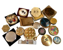 A collection of interesting vintage compacts to include a 1950s Octagonal compact with spiderweb