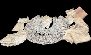 A group of antique lace collars, bonnet veils etc to include a large brussels lace collar, a