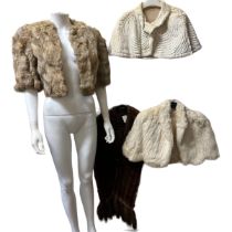 A group of 1930s and 40s fur items to include a dyed squirrel muff with purple satin lining, a