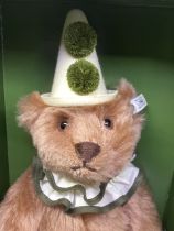 Steiff Vintage Boxed Magnificent Harrods London Musical clown Teddy bear, with green tipped ruffle