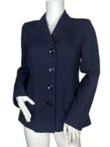 A wartime 1940s jacket made from a fine herringbone weave wool cloth in navy blue with an