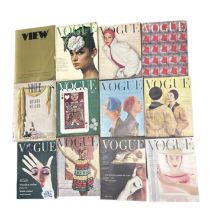 A collection of 11 vintage Vogue magazines, mostly from 1954 along with one from 1939 and a 1970s