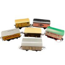 A selection of vintage railway wagons to include a Bailoy Taylor carriage featuring a Halls