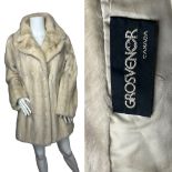 A vintage Azurene mink jacket by Grosvenor Canada with satin lining, self lined collar and three