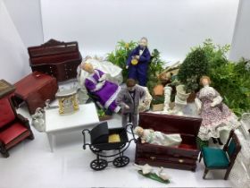 Vintage dolls house Furniture and accessories and dolls house dolls. The dolls are from Dolls