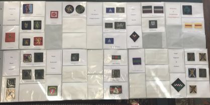 10 double side display pages, containing modern embroidered British cloth regimental / divisional