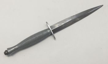 A Post War WW2 Fairbairn Sykes style commando knife. Based on the WW2 era 3rd pattern, with cast