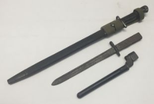 A WW1 era Royal Marines interest 1907 pattern bayonet, with scabbard, by Wilkinson. Marked ‘11 18’