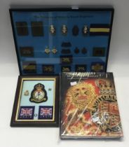 2 framed displays of British Army metal and cloth badges. To include: The Princess of Wales’ Royal