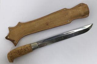 A vintage Finnish Puukko knife, in the Ilves (Lynx) pattern, by Janne Marttiini. Of traditional