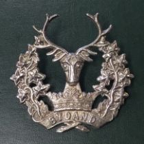 A vintage sterling silver officers cap badge for the Gordon Highlanders. A die stamped example,