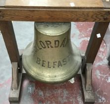 SS Lordantrim Ships Bell in Wooden Frame. Bell size approximately 35cm wide by 33cm high.  The