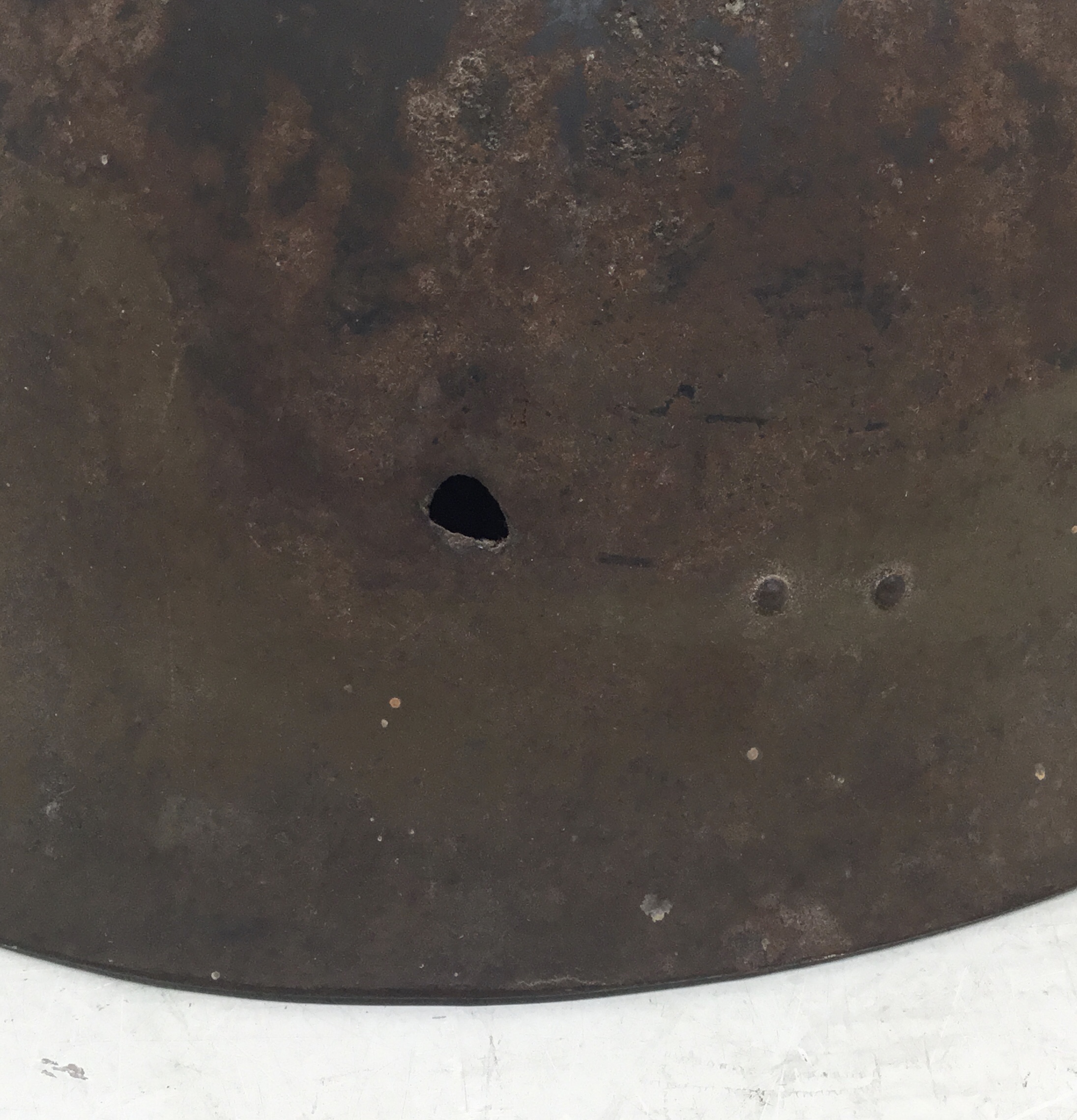 A WW2 era Japanese type 90 battle damaged steel helmet. A semi relic piece, with just the shell - Image 5 of 9