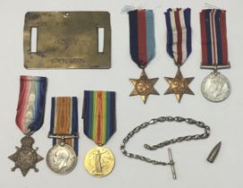 An interesting WW1 1914 Star Prisoner of War medal trio, and associated items, awarded to 8887 Pte