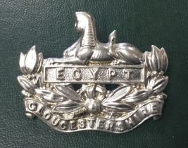 A good quality vintage die stamped sterling silver officer’s cap badge for the Gloucestershire