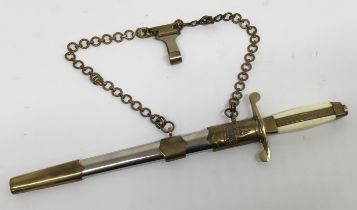 A M1951 Bulgarian army officers dagger, complete with scabbard and suspension chain. Moulded