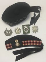 A post WW2 glengarry cap, with red, white and blue diced band, red tourie, black rosette fitted with