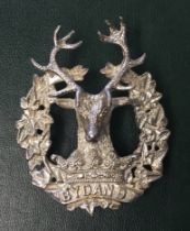 A fine quality and heavy gauge cast sterling silver officers cap badge for the Gordon Highlanders.