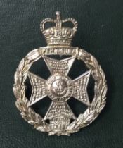 A vintage Royal Green Jackets sterling silver officer’s cap badge. Fully U.K. hallmarked to the