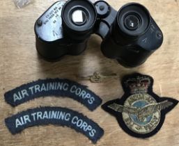Military group of 1943 dated binoculars by Taylor-Hobson RAF uniform badges, RN sweetheart badge