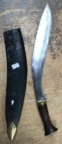 WW2 Indian Army Kukri Knife & Scabbed. Brass mounts with etched design to blade.