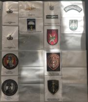 A mixed selection of parachute qualification badges, and police anti-terrorist badges from across