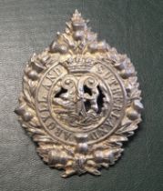 A vintage sterling silver Argyll & Sutherland cap badge. Of standard form, with 2 silver lugs to the