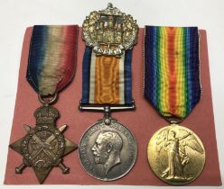 A WW1 1914 Star trio, and cap badge, awarded to 7112 L.Cpl A. Edwards of the 2nd Essex Regiment.