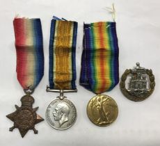 A WW1 1914 Star trio, awarded to 8229 Pte E. Russell of the Dorset Regiment. To include: the 1914