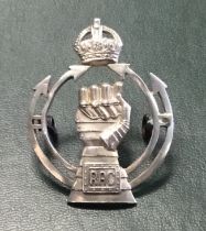 A WW2 / early 1950’s era Royal Armoured Corps sterling silver cap badge. Of standard form, with