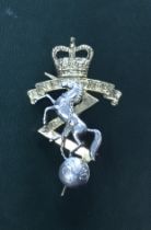 A vintage Royal Electrical and Mechanical Engineers (REME) sterling silver cap badge. Made to