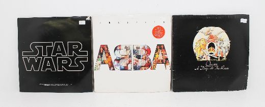 3 X Records 1977 Starwars LP, Queen A day at the Races and Absolute Abba LP.
