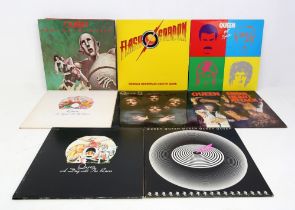 Collection of Queen vinyl LP records including Jazz with Poster, Sheer Heart Attack, Queen II, A