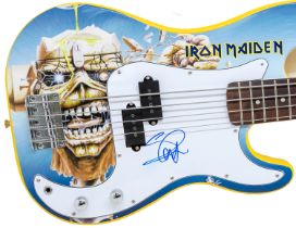 Steve Harris Iron Maiden Bass guitarist and primary songwriter.   A signed customised Guitar -