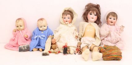 Dolls: A collection of assorted 20th century dolls, to include: Armand Marseille 990 bisque head