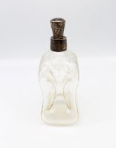 An Edwardian silver collared glug glug decanter, of stylish form with plain silver collar, the