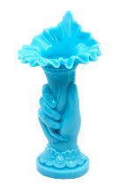 Hollywood Regency blue milk glass vase designed as a Cornucopia being held by a hand.