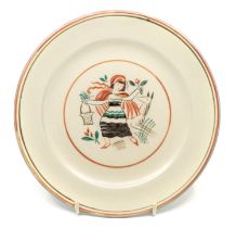 A Poole Pottery plate designed by Truda Adams, depicting a lady to centre, green bordered back