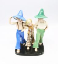 Goldscheider - a 1930s pottery figural group modelled as two young boys, both wearing pointed