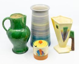 Clarice Cliff: a Crocus pattern preserve pot and cover, cylindrical form, stamped Bizarre by Clarice