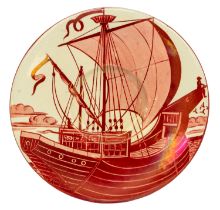 A William de Morgan (1839-1917) Galleon plate painted in ruby lustre on white ground, the reverse