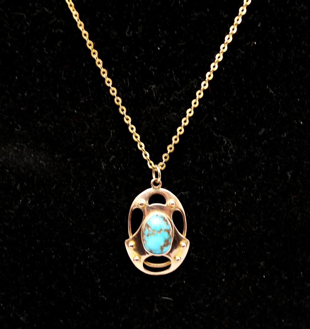 An early 20th century Liberty Style Jugendstil / Art Nouveau 9ct gold and turquoise pendant, with