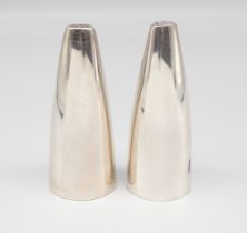 Georg Jensen: A pair of Henning Koppel designed silver salt & pepper pots, design no 1102, import