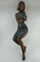 A large Art Deco style decorated figure of an oriental girl, detached from stand. Height 114cm
