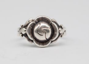 Georg Jensen - A stylish mid-century Danish silver ring, with intricate crossed shank and central